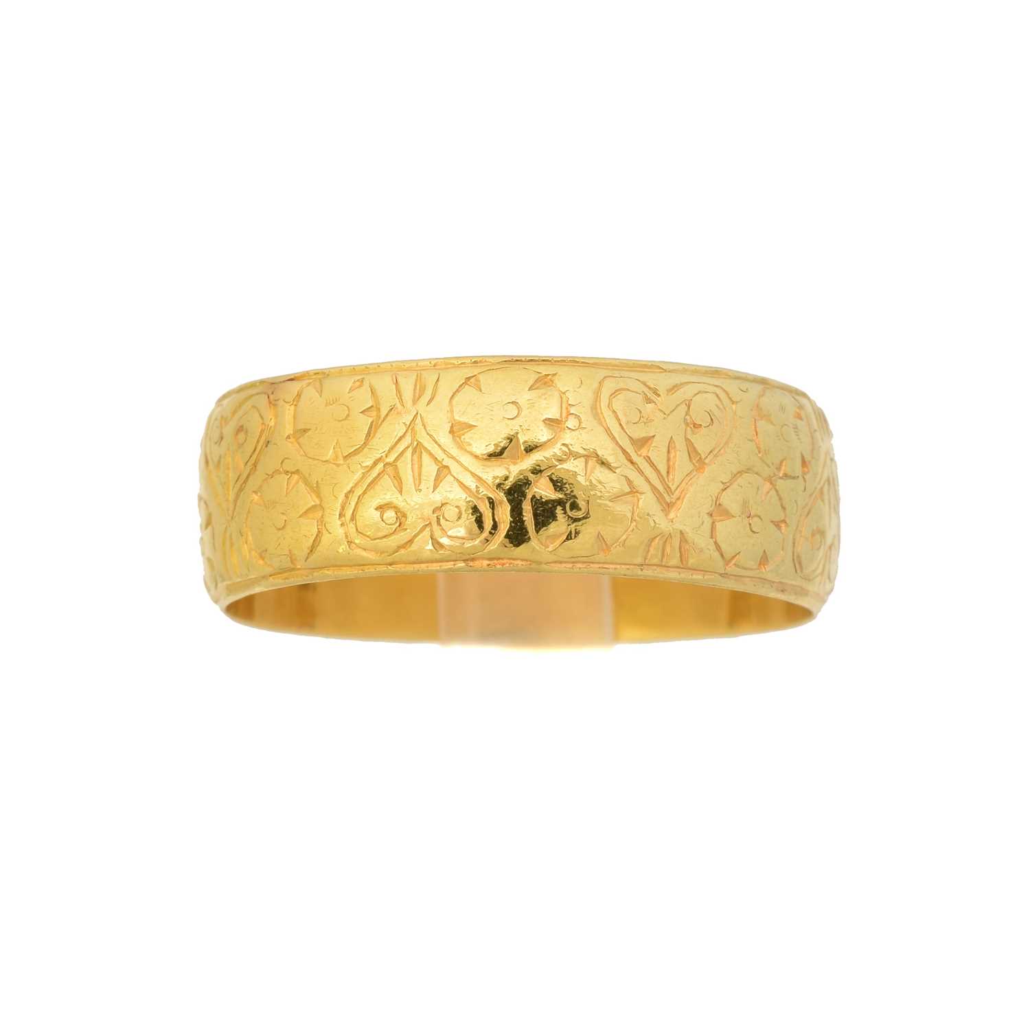 Lot 121 - An early 20th century 22ct gold band ring