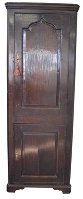 Lot 293 - 18th-century oak floor standing corner cupboard