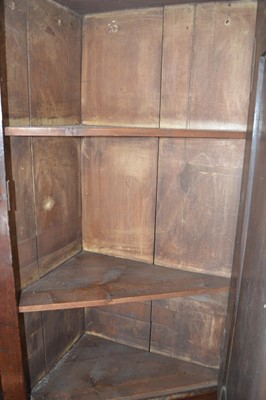 Lot 293 - 18th-century oak floor standing corner cupboard