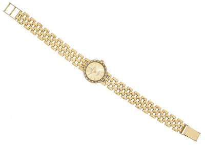 Lot 149 - A 9ct gold diamond Sovereign quartz watch