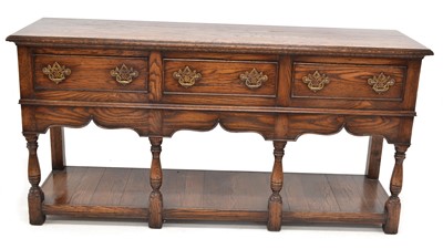 Lot 432 - Late 20th-century reproduction Marthenshire oak dresser base