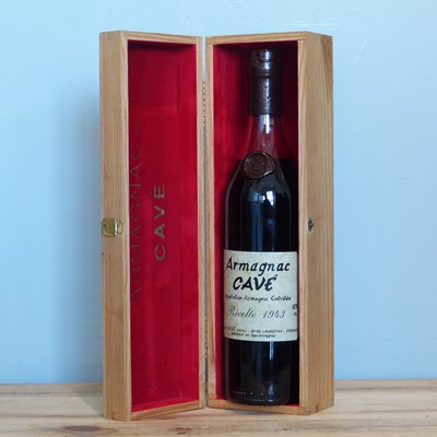 Lot 185 - 1 Bottle (70 cl.) 1943 Cavé Vintage Armagnac – bottled at 50 yo - in wooden presentation box