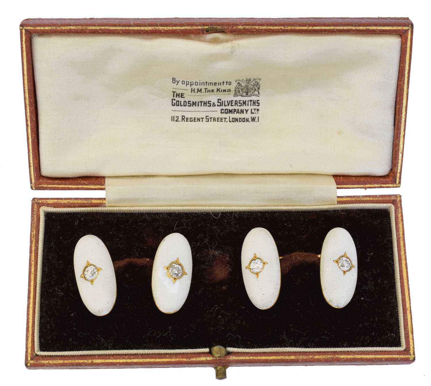 Lot 129 - A pair of French 18ct gold enamel and diamond cufflinks
