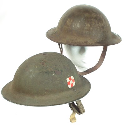 Lot 163 - Two British Brodie helmets