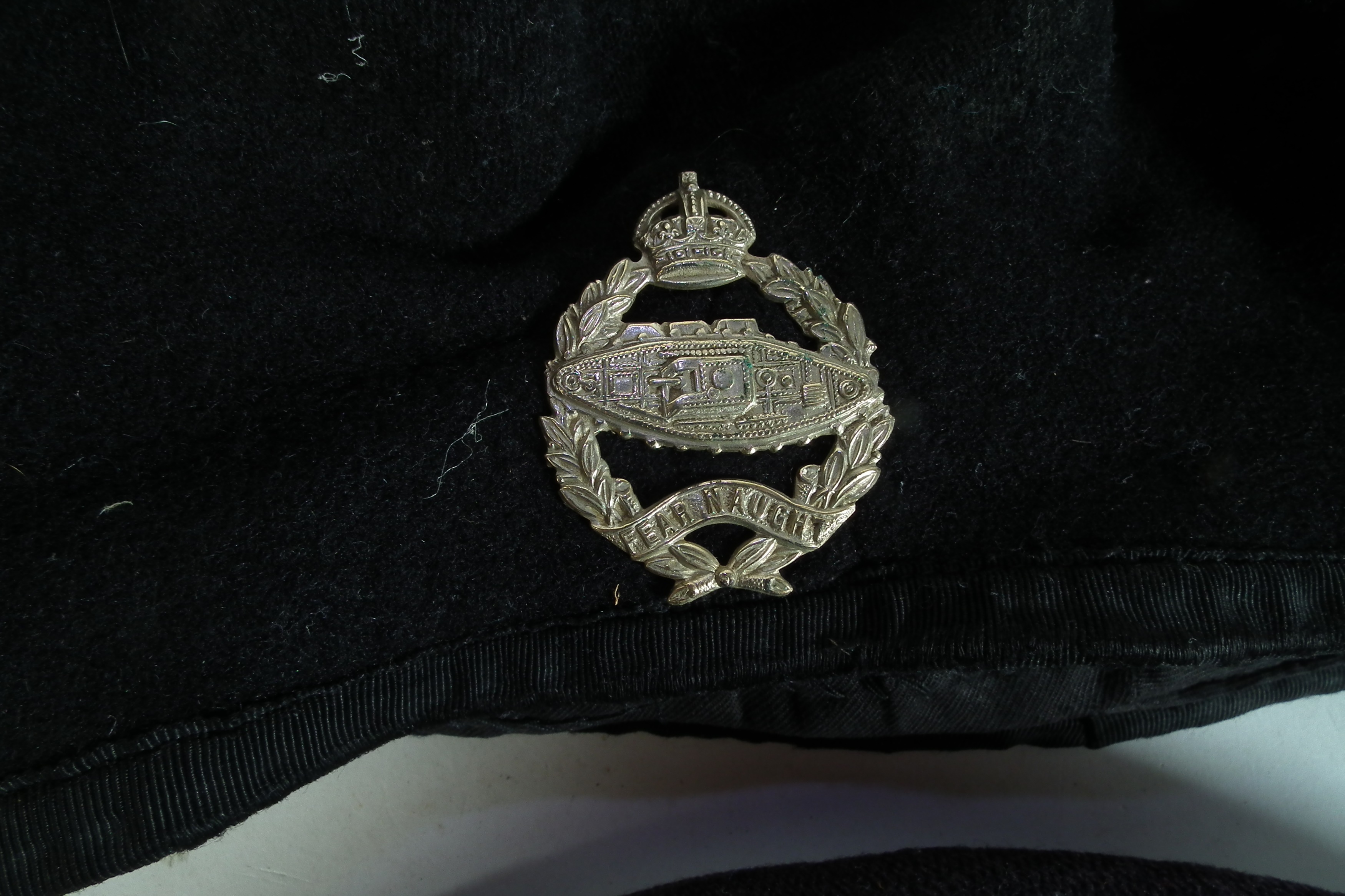 Four British army caps