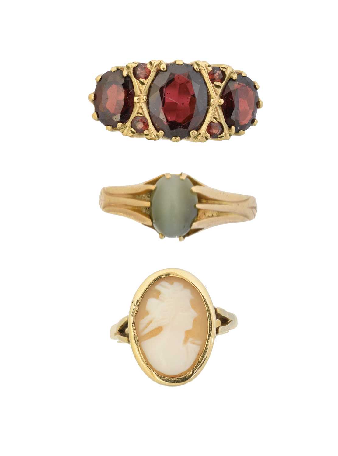 Lot 82 - Three gem-set dress rings