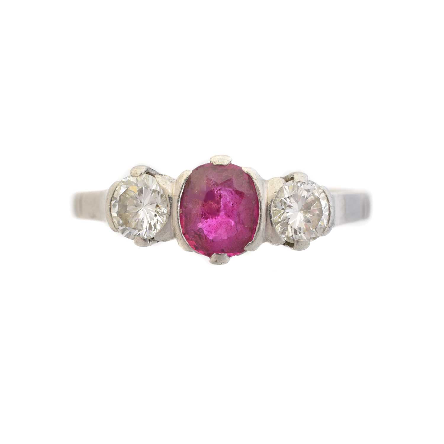 Lot 76 - A ruby and diamond three stone ring