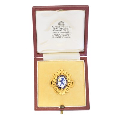Lot 5 - A 9ct gold enamel brooch by Garrard & Co.