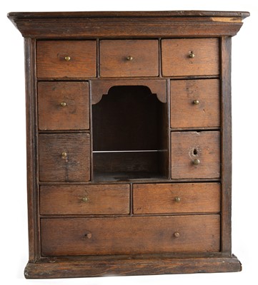 Lot 212 - 18th-century oak spice cupboard