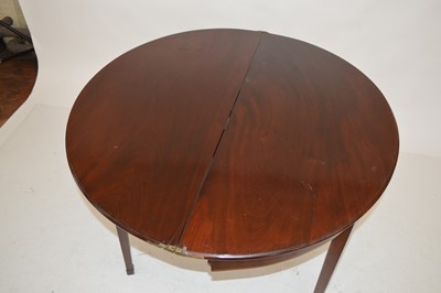 Lot 261 - George III mahogany fold-over tea table