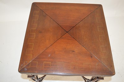 Lot 398 - Edwardian mahogany envelope card table