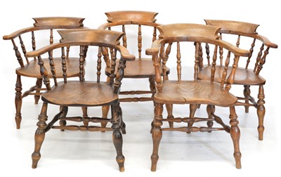 Lot 369 - A collection of five late 19th-century beech and elm club chairs