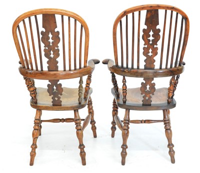 Lot 370 - A pair of mid-19th century yew wood and elm hight back Windsor chairs