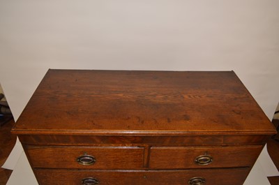 Lot 429 - George III oak chest of drawers
