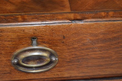 Lot 429 - George III oak chest of drawers