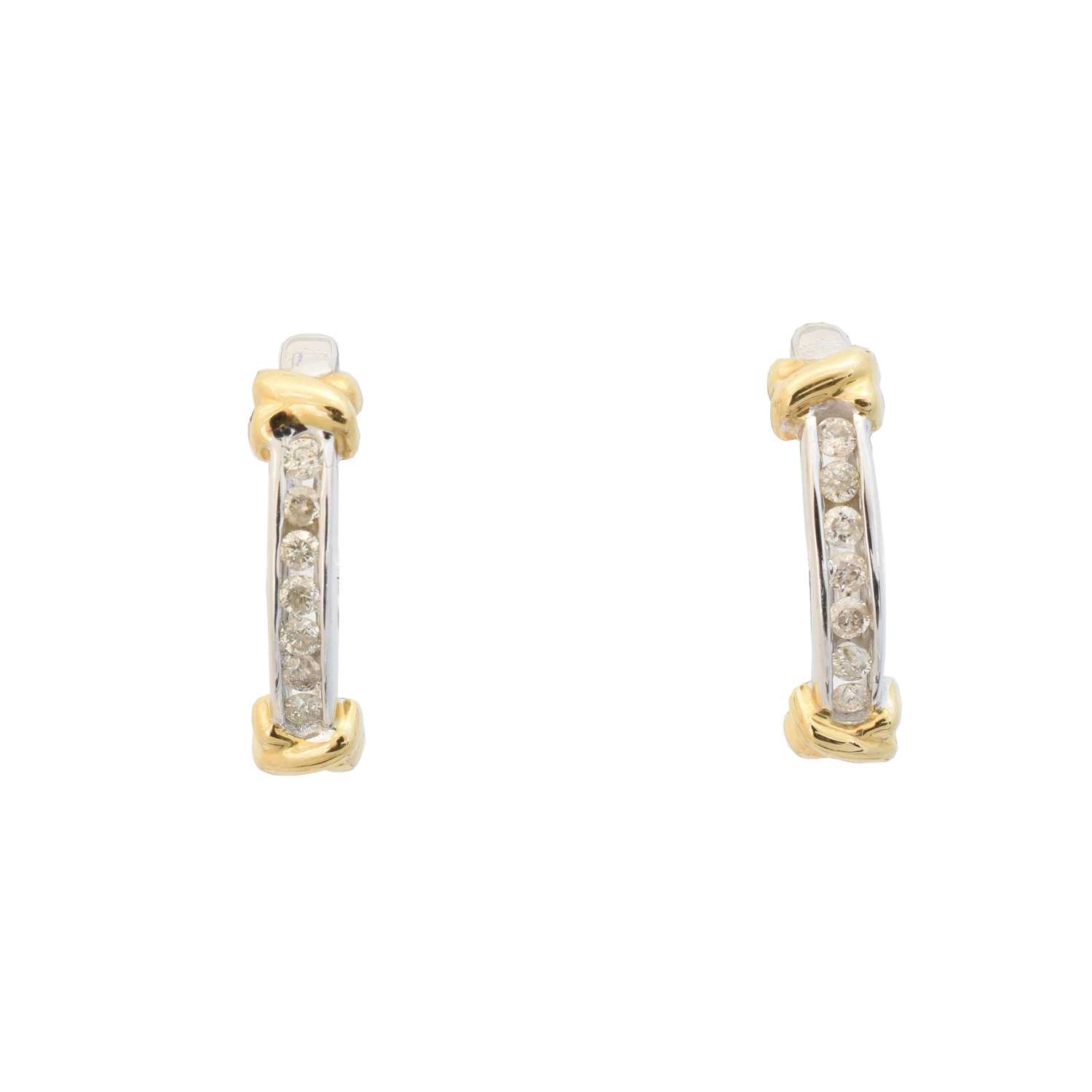 Lot 44 - A pair of diamond hoop earrings