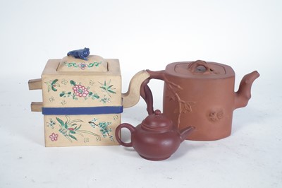 Lot 148 - Three Chinese Yixing teapots
