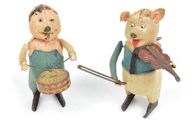 Lot 113 - Two 1930s Schuco Disney's The Three Little Pigs clockwork toys