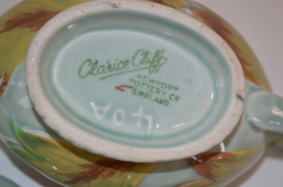 Lot 122 - Clarice Cliff Crocus preserve pot and a sauceboat