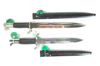 Lot 83 - Two German dress bayonets and scabbards