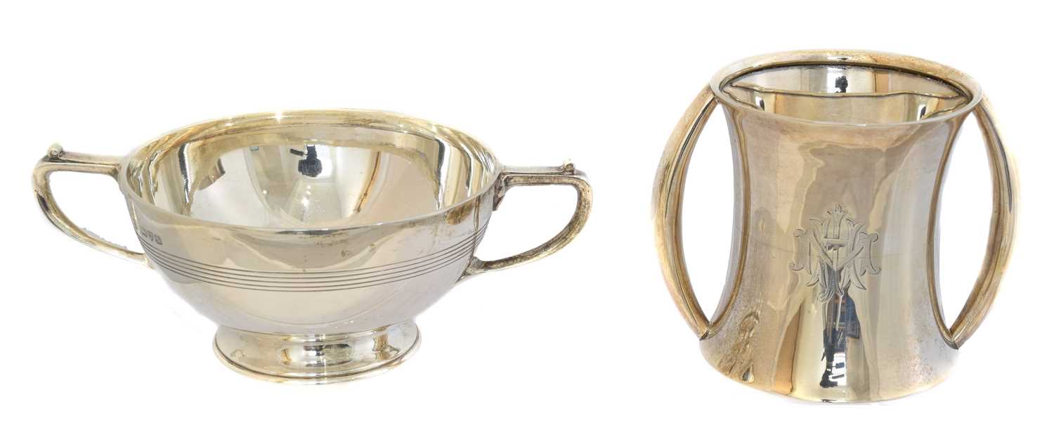 Lot 152 - Two silver twin handled cups