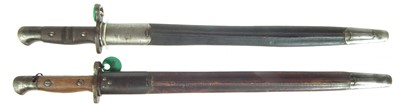Lot 53 - Two British / American bayonets and scabbards