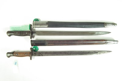 Lot 53 - Two British / American bayonets and scabbards