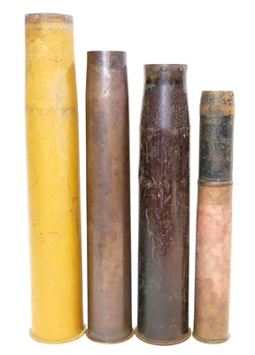 Lot 142 - Four shell cases, one with head