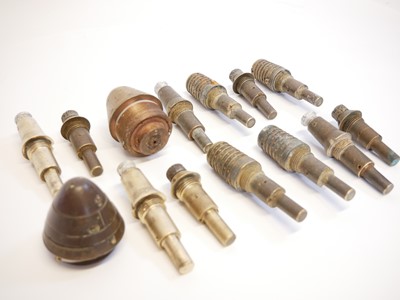 Lot 131 - Twelve WWI French artillery shell fuses and two British examples.