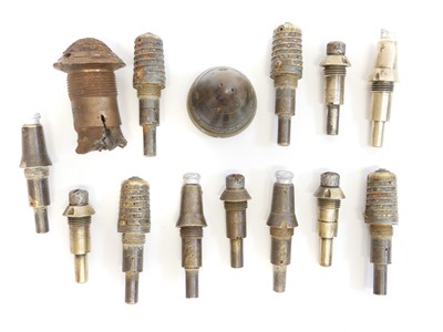 Lot 119 - Twelve French WWI fuses, and a British and German example.