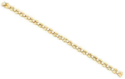 Lot 35 - An 18ct gold diamond bracelet