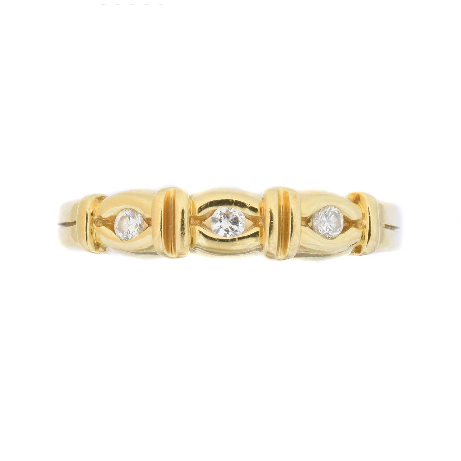 Lot 115 - An 18ct gold diamond three stone ring