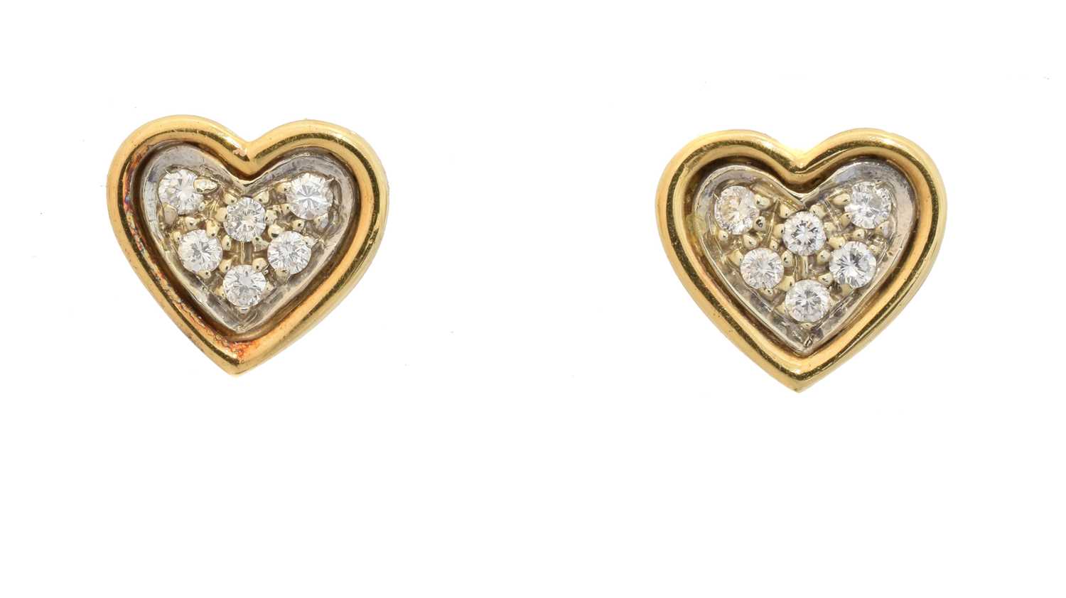 Lot 43 - A pair of 18ct gold diamond heart stud earrings