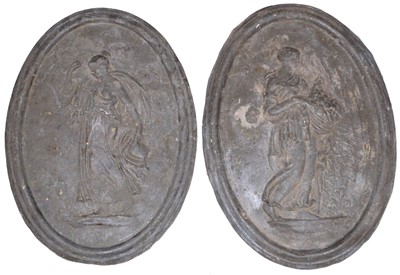 Lot 307 - A pair of oval cast lead wall plaques