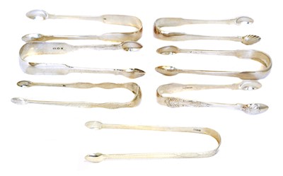 Lot 203 - A selection of George III and later silver sugar tongs