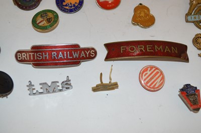 Lot 79 - A collection of buttons, badges, patches and more