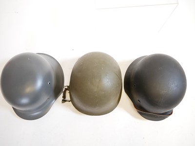 Lot 153 - Three Helmets