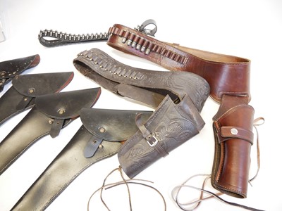 Lot 156 - Two Western revolver holster rigs and other holsters