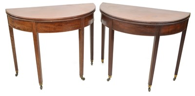 Lot 416 - A pair of mid-19th-century fold-over tea tables