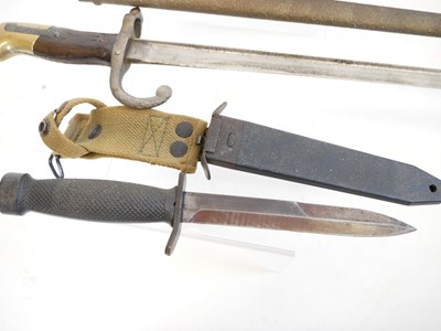 Lot 305 - Two daggers and a bayonet