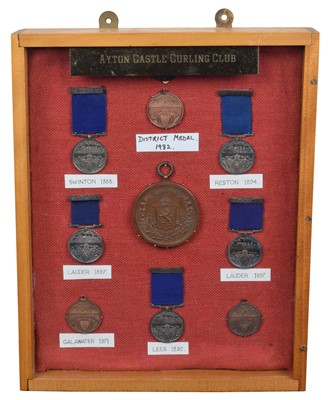 Lot 309 - Cabinet containing medals