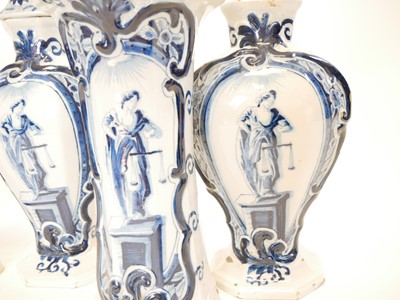Lot 235 - Garniture of five Delft vases