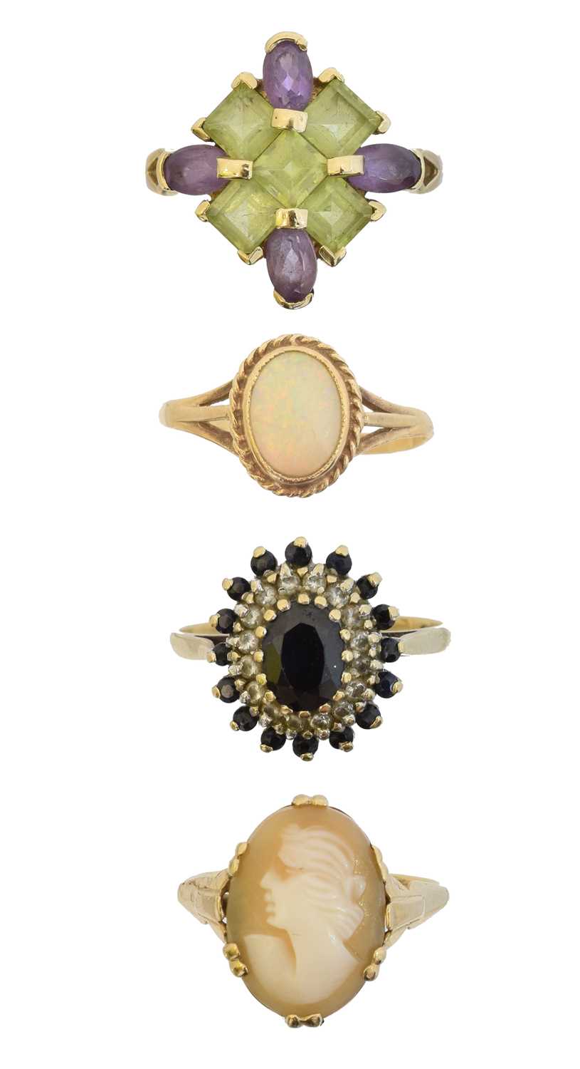 Lot 67 - Four 9ct gold gem set dress rings