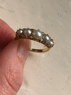 Lot 106 - An 18ct gold split pearl and diamond dress ring