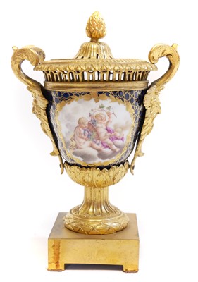 Lot 183 - German porcelain ormolu mounted vase