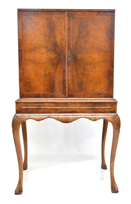 Lot 281 - Mid-20th-century walnut veneered cocktail cabinet