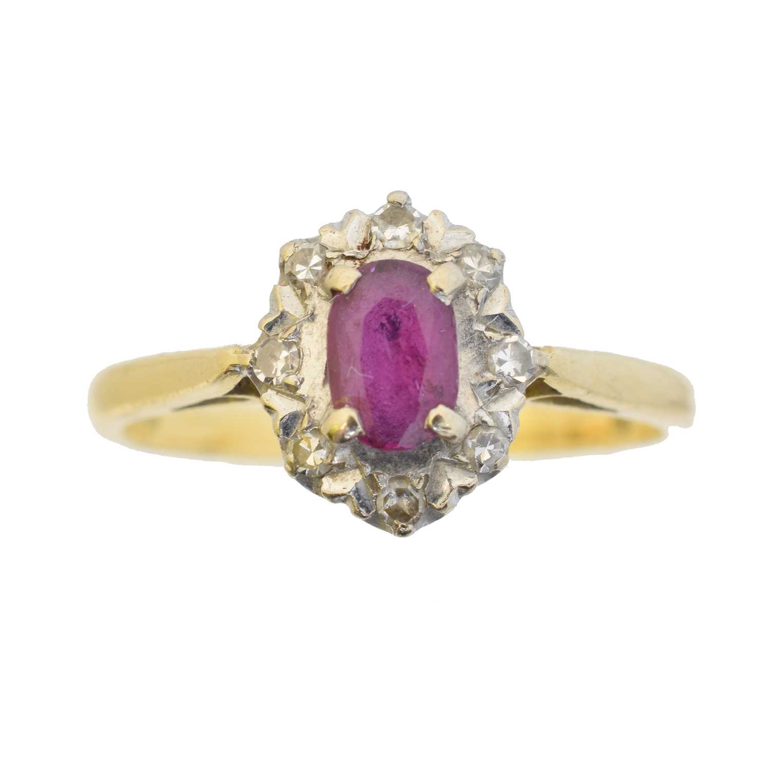 Lot 59 - An 18ct gold ruby and diamond cluster ring