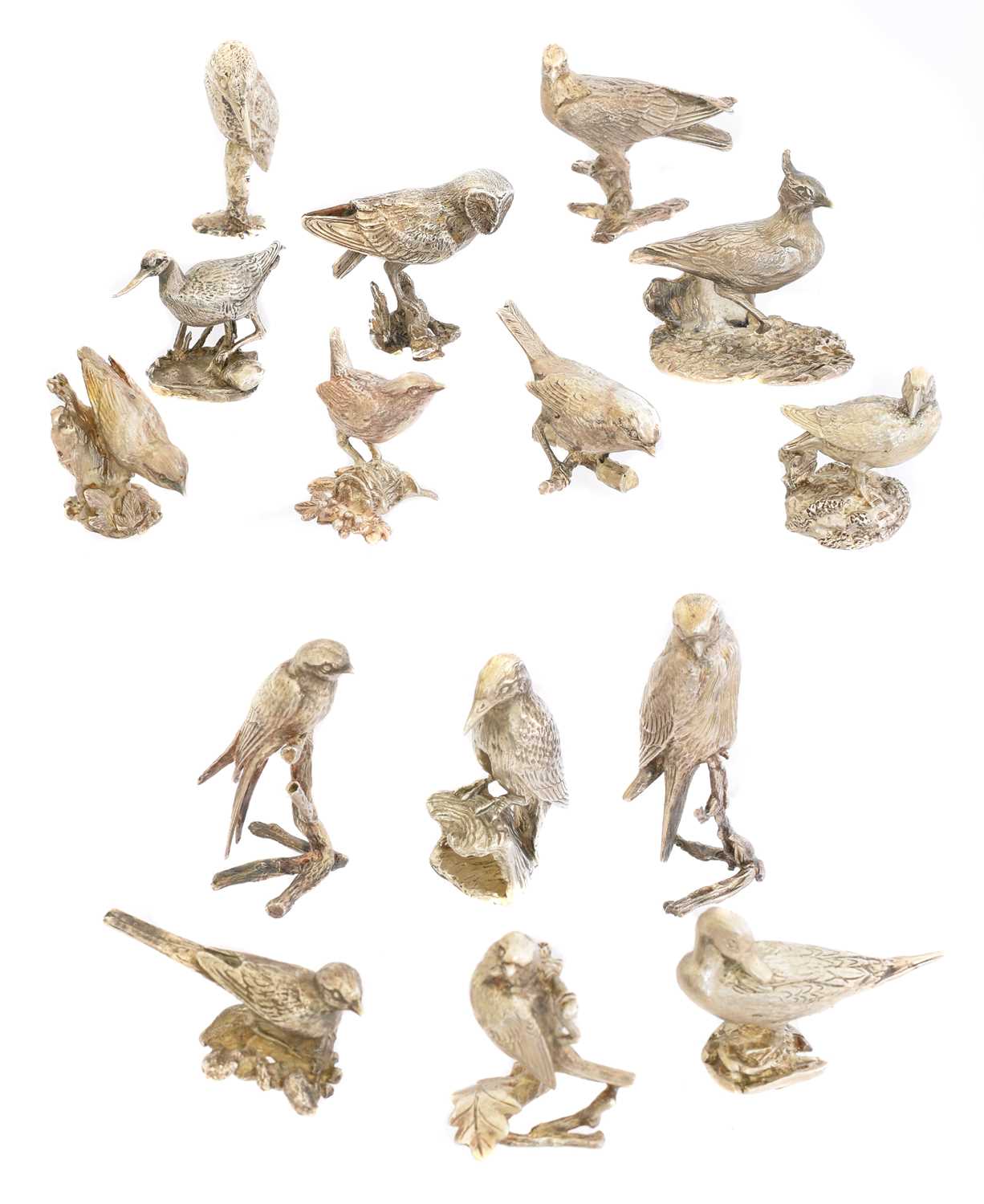 Lot 134 - A set of fifteen silver models of birds