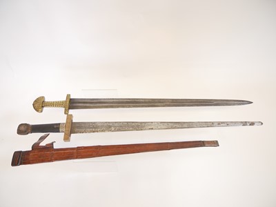 Lot 242 - Two Viking replica swords