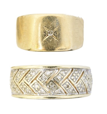 Lot 63 - Two 9ct gold diamond band rings